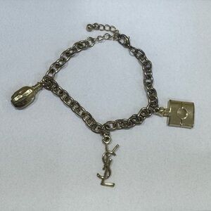 YSL Yves Saint Laurent  Vintage 3 Charms Gold Tone Bracelet with Iconic Logo